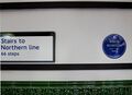Willie Rushton's blue plaque in Mornington Crescent station.jpg